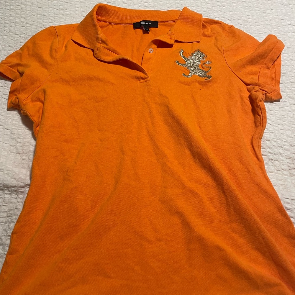 Women’s Orange Express Shirt with a cute lion design on the chest